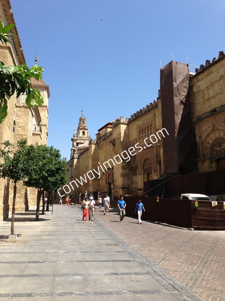 This image shows on the right a side view of the great mosque in Cordoba Extremadura Spain